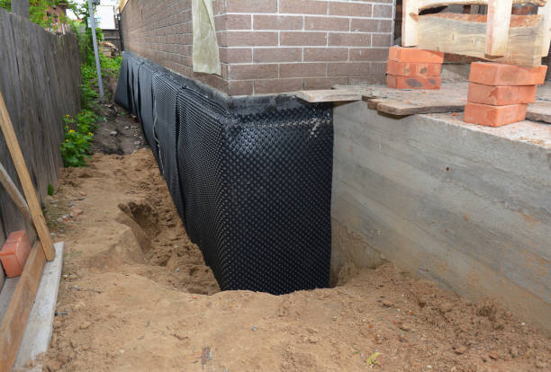 SJ Waterproofing Pros technician performing targeted Vapor Barrier Installation assessment in Purcellville, VA